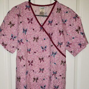 Women's scrub top with tie in back and two front pockets